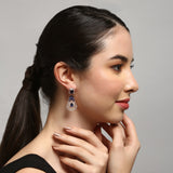 Handcrafted rose gold plated blue dangler american diamond earrings