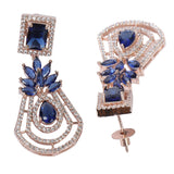 Handcrafted rose gold plated blue dangler american diamond earrings