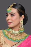 Green enameled Kundan Maharani Necklace and earrings with Maang Tikka