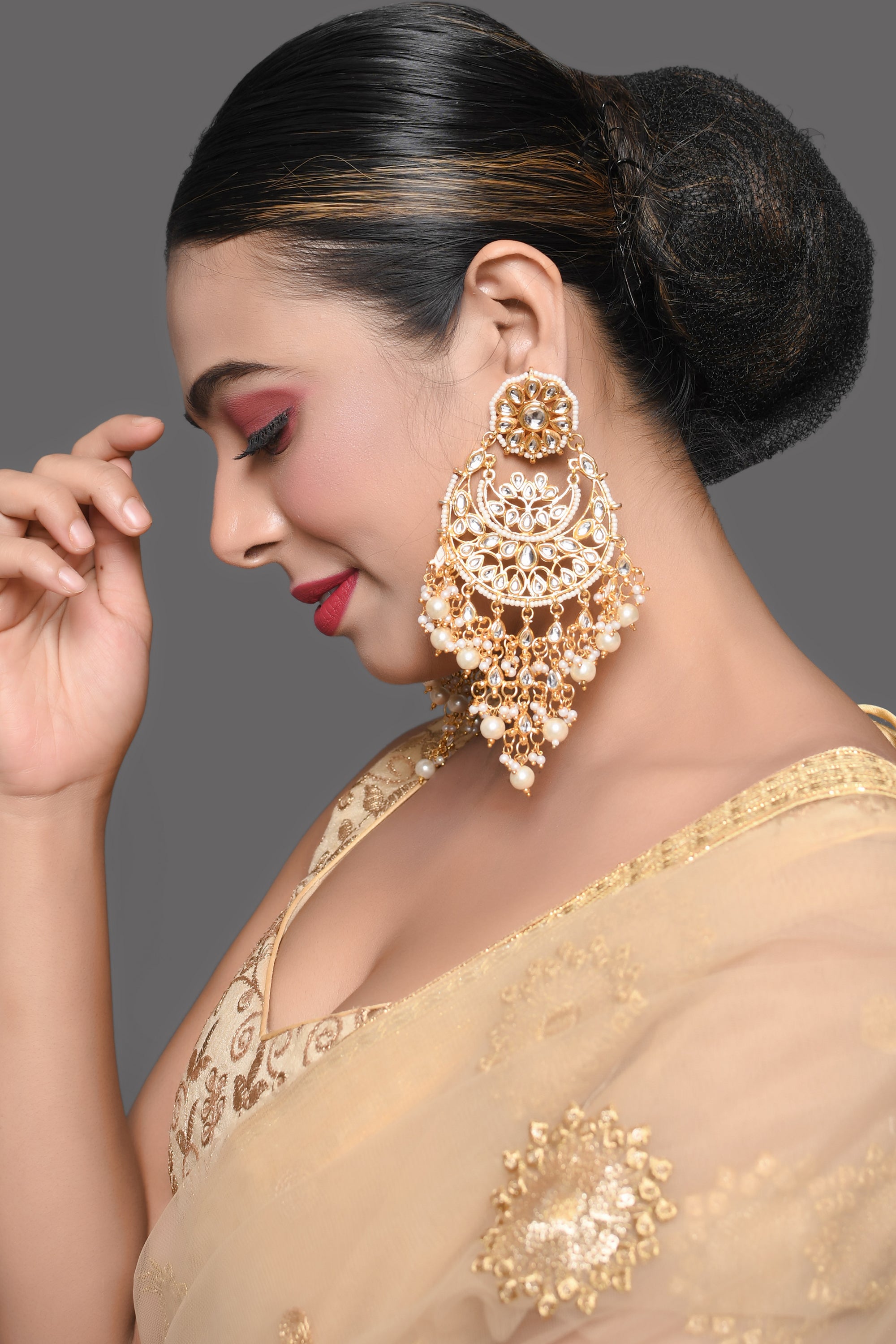 Gold toned Kundan chandbali with pearl