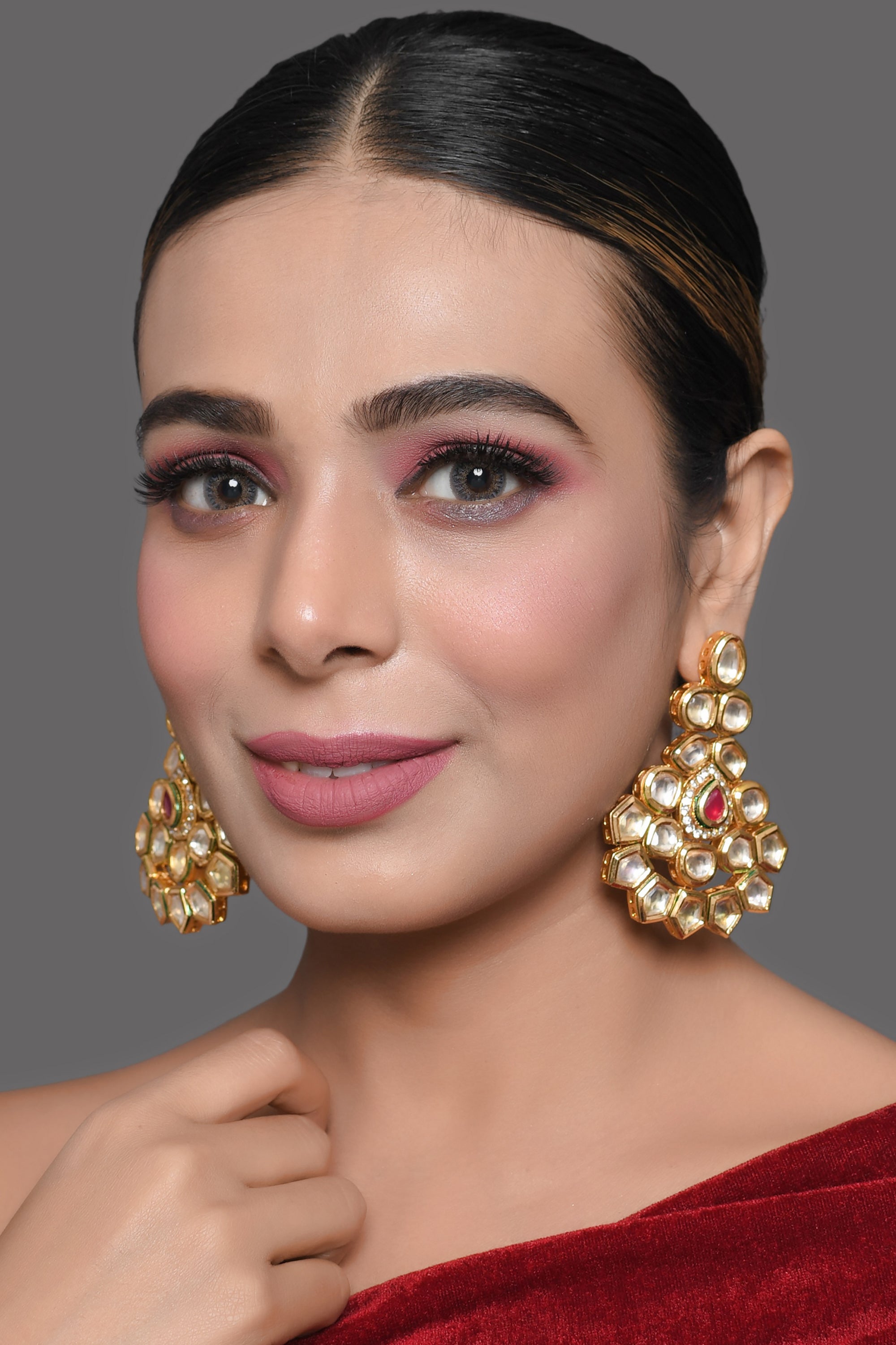 Handcrafted Kundan Studded gold toned earring