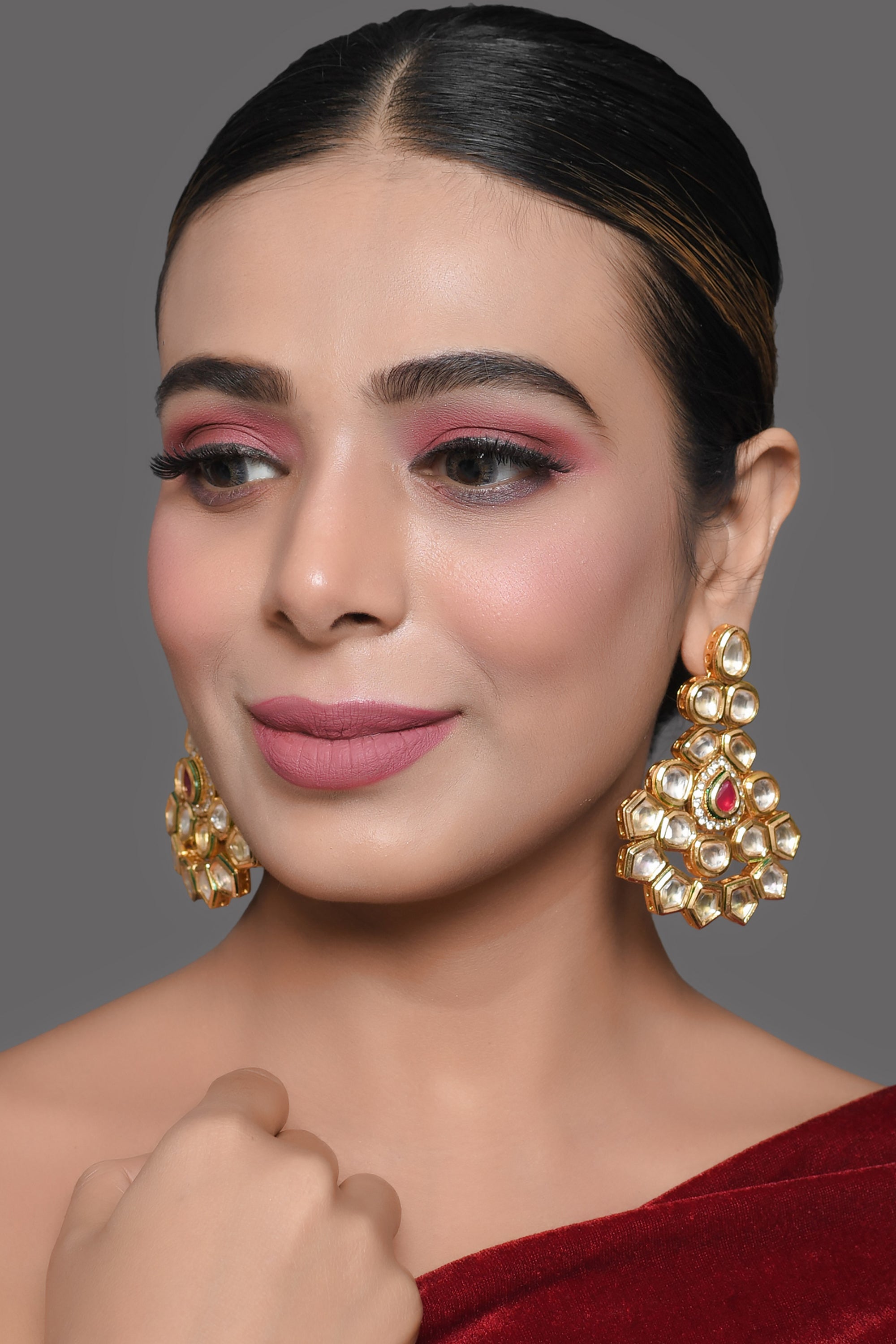 Handcrafted Kundan Studded gold toned earring