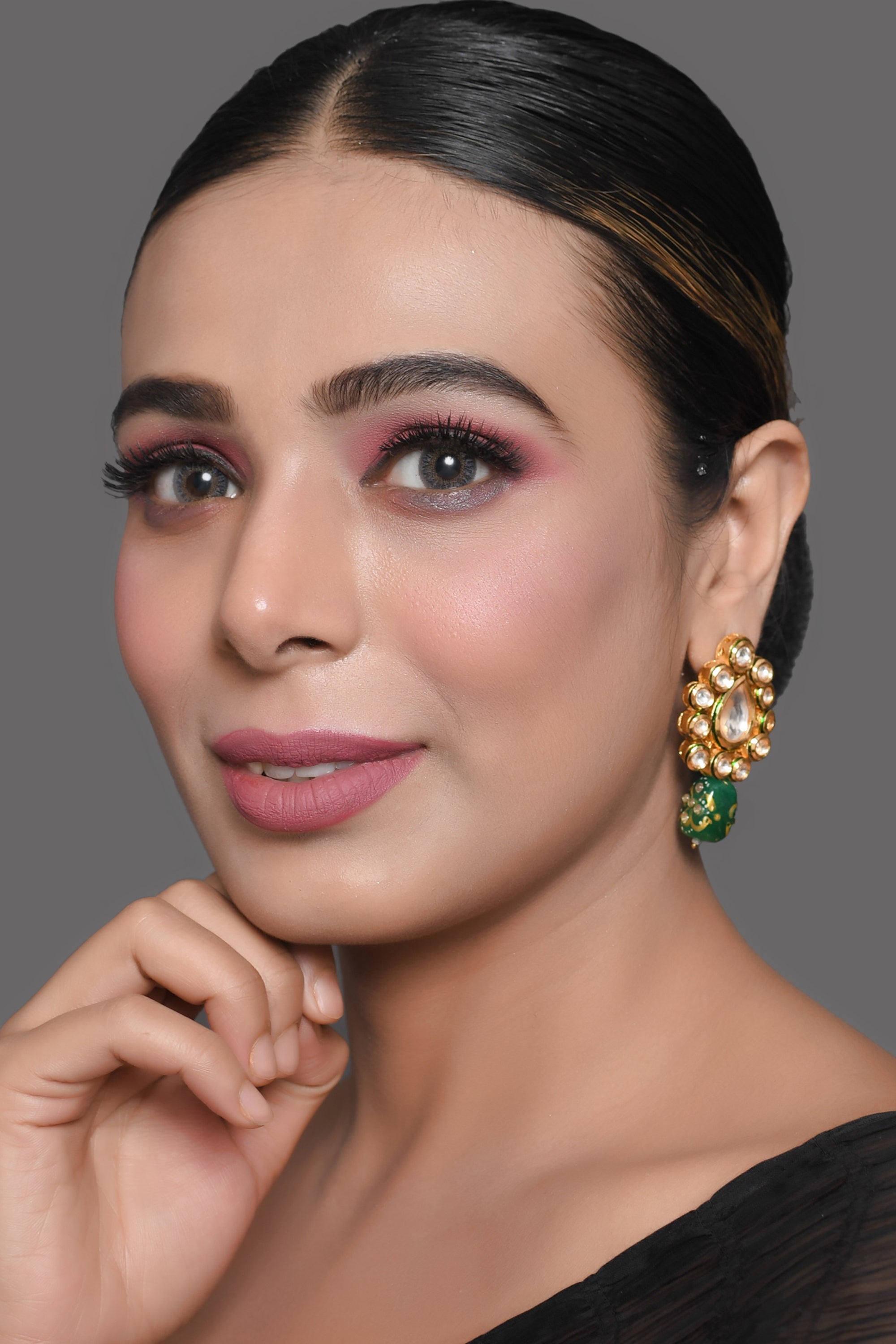 Gold toned green beaded Kundan earring