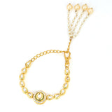 Gold toned kundan inspired bracelet with pearls