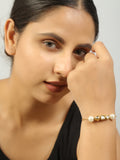 Gold toned kundan inspired bracelet with pearls