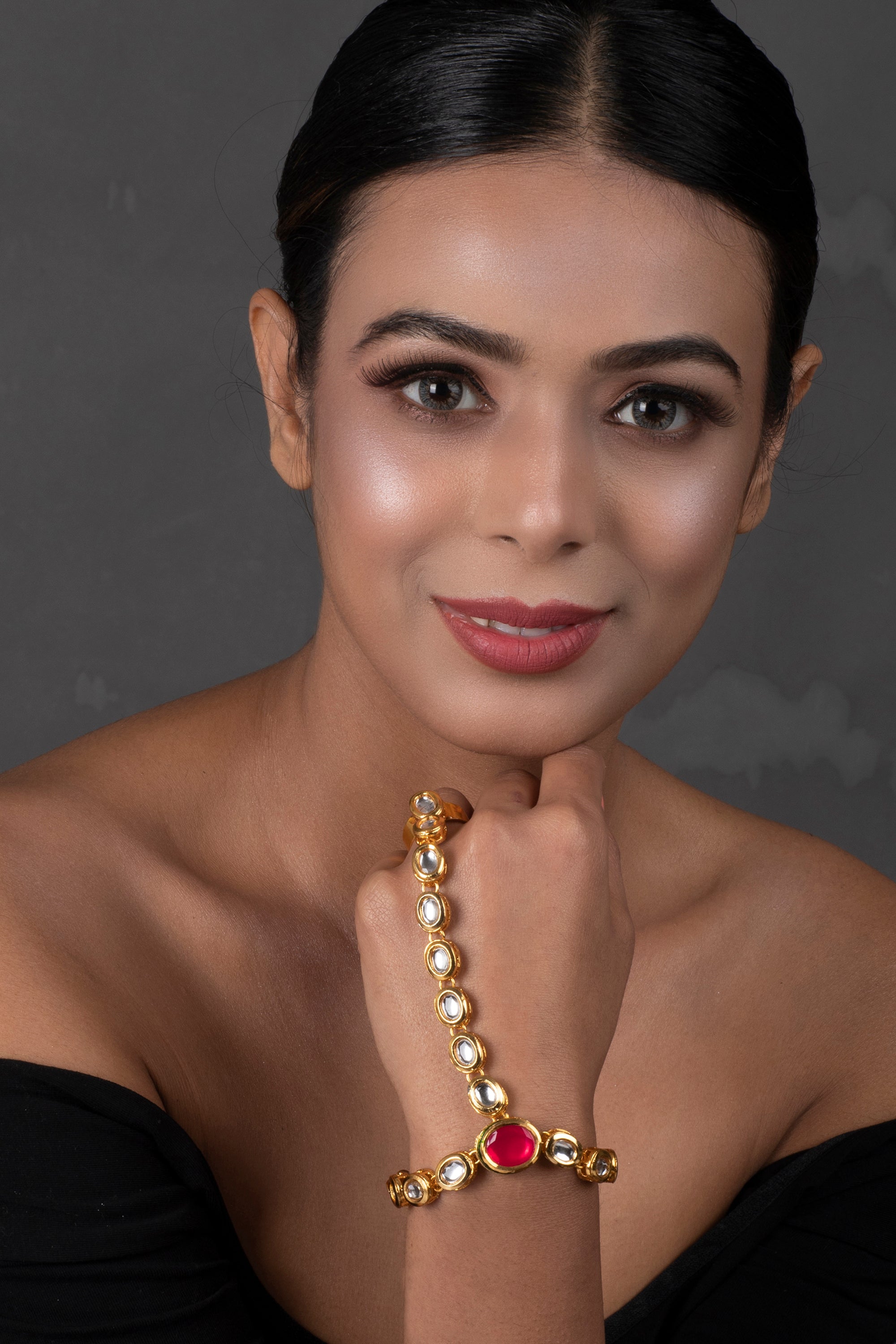 Red Gold toned royal kundan hathphool