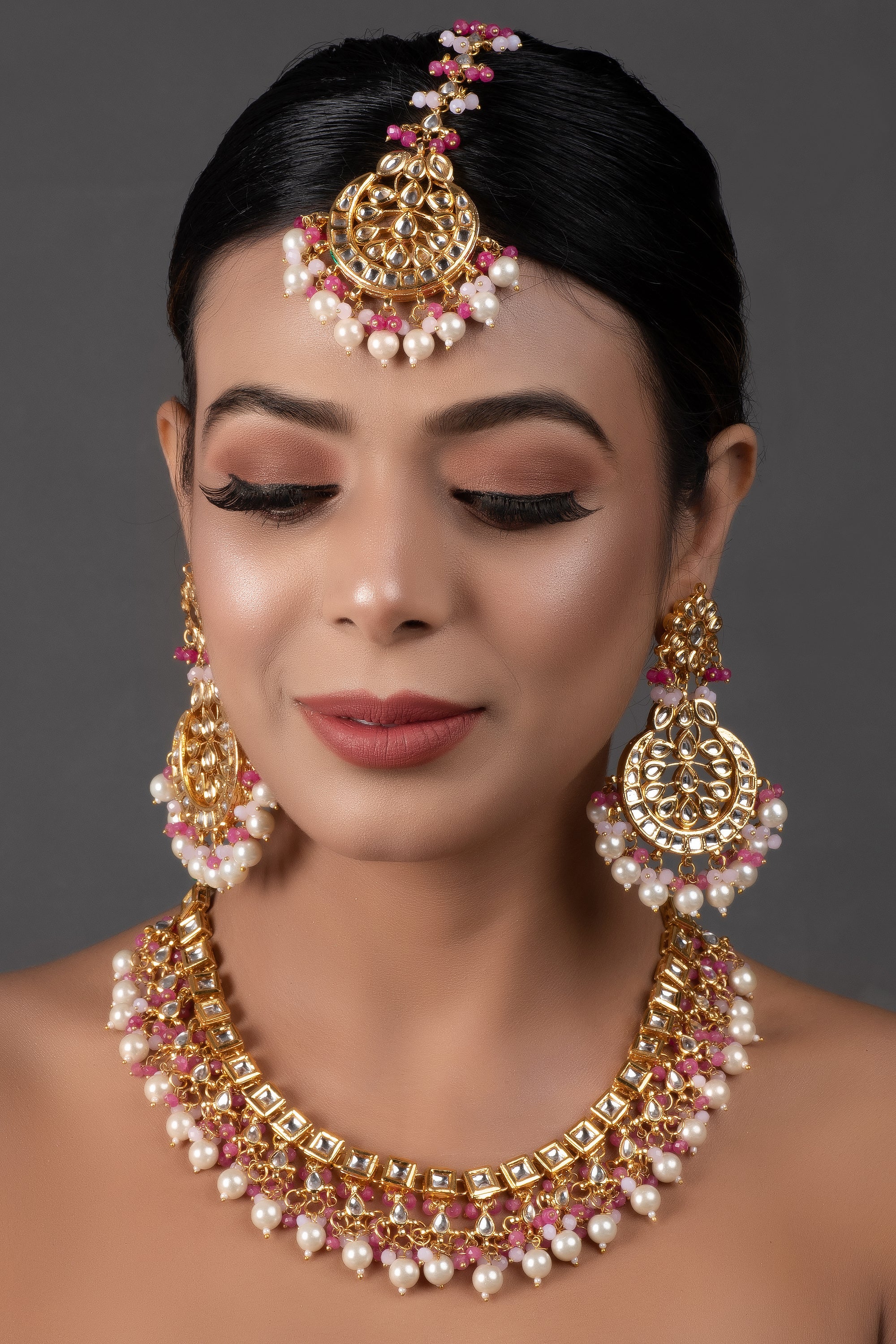 Pearl & Pink beaded Gold Tone Kundan Inspired Necklace with Earrings and Maang Tikka