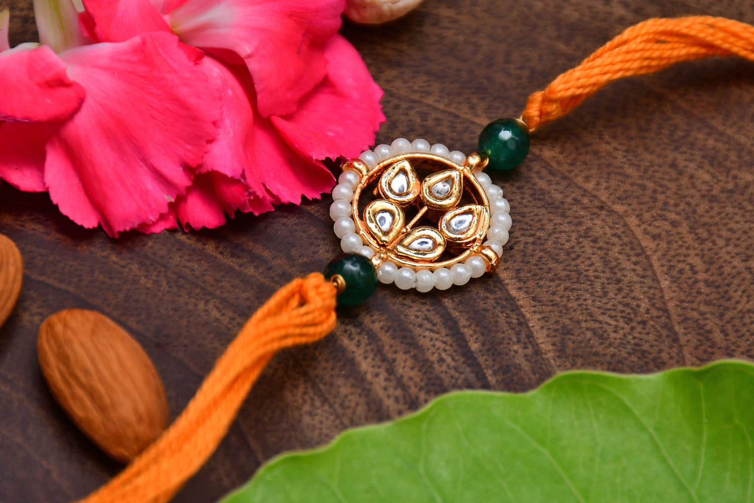 Kundan floral  Gold Tone Kundan Rakhi with organish yellow