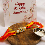 High quality Kundan studded rakhi with yellow cotton thread