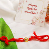 High quality Kundan studded rakhi with yellow cotton thread