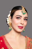 Red Gold toned Kundan earrings with Maang Tikka