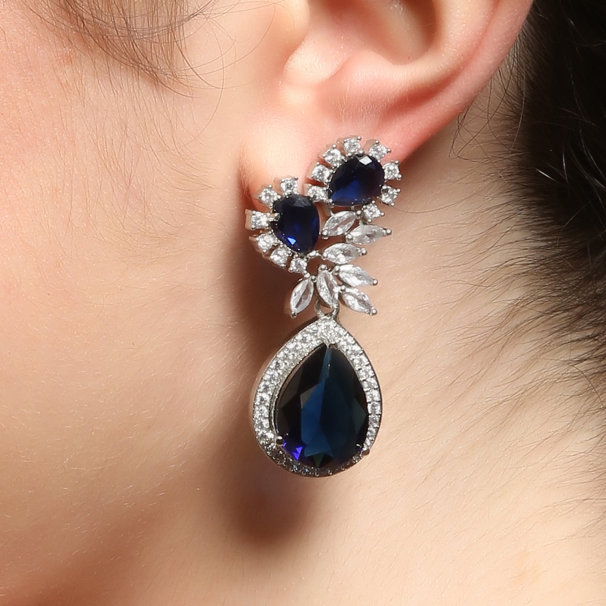 Dazzling blue and white threestep jumkha silver earrings  Jugal Kishore  Jewellers
