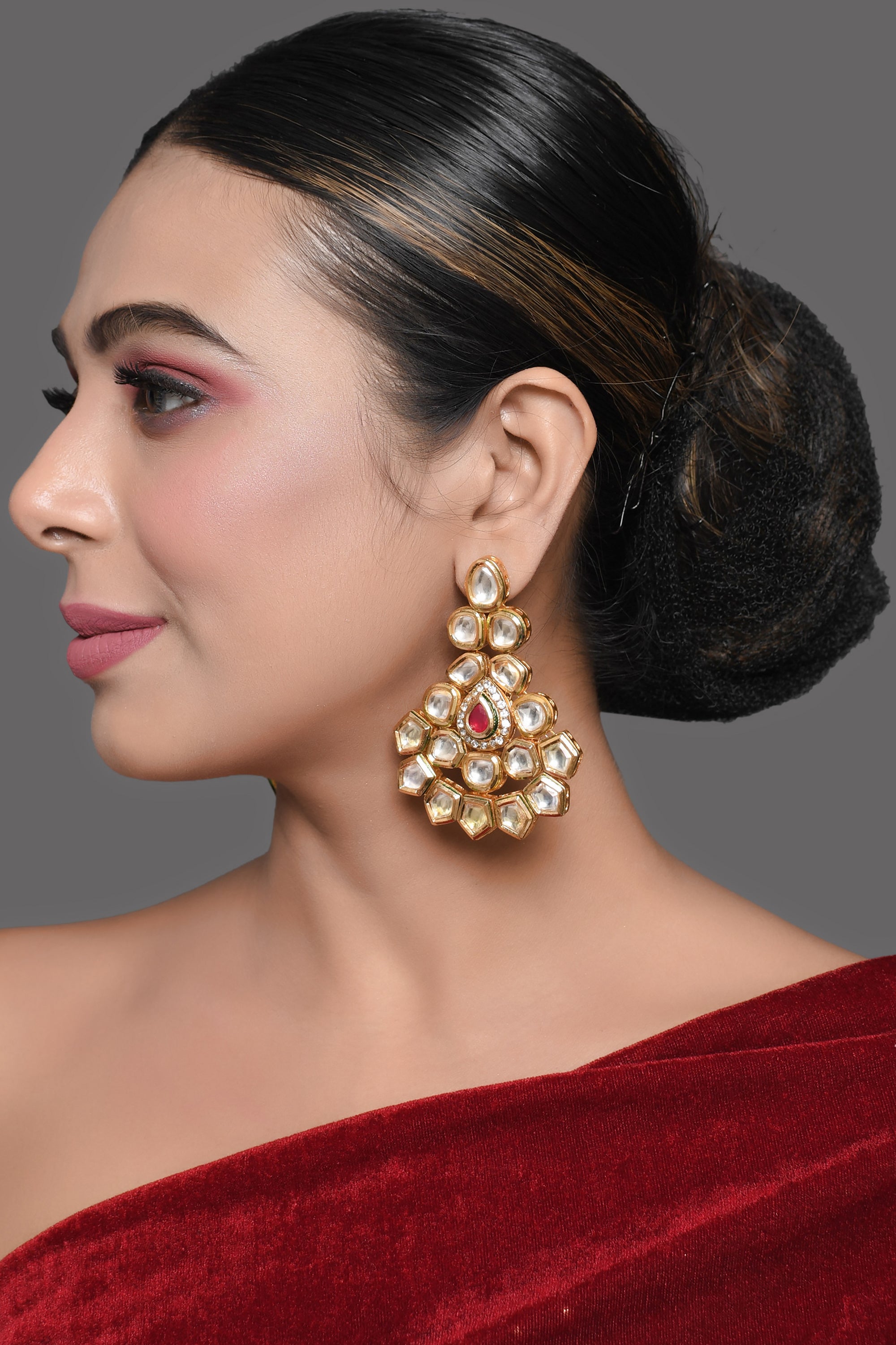 Handcrafted Kundan Studded gold toned earring