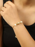 Gold toned kundan inspired bracelet with pearls