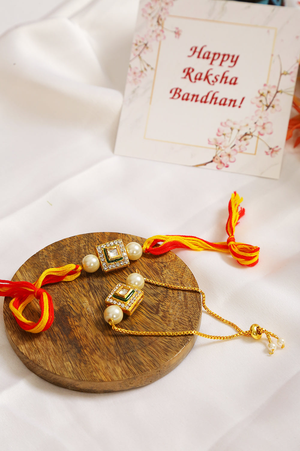Handcrafted Studded Kundan Rakhi & lumba set- Set of 2